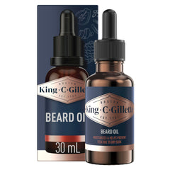 King C. Gillette beard oil bottle close-up with argan oil nourishes skin beneath beard.