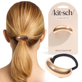 Kitsch coletero dorado de metal con cierre elegante para coletas pulidas.