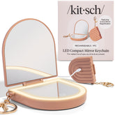 Kitsch compact mirror keychain with lights for quick touch-ups on the go.