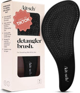 Kitsch Detangler Brush closeup with flexible bristles for gentle detangling.