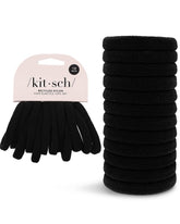 Kitsch ligas de pelo nylon negro, primer plano, agarre estable para todo el día