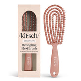 Kitsch Flexi Flow detangler glides through knots for smoother detangling.