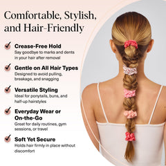 Kitsch Satin Scrunchie worn on the wrist, a chic hair accessory.
