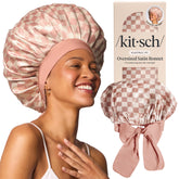 Kitsch XL satin bonnet for sleeping in terracotta checker cushions hair overnight with gentle satin protection.