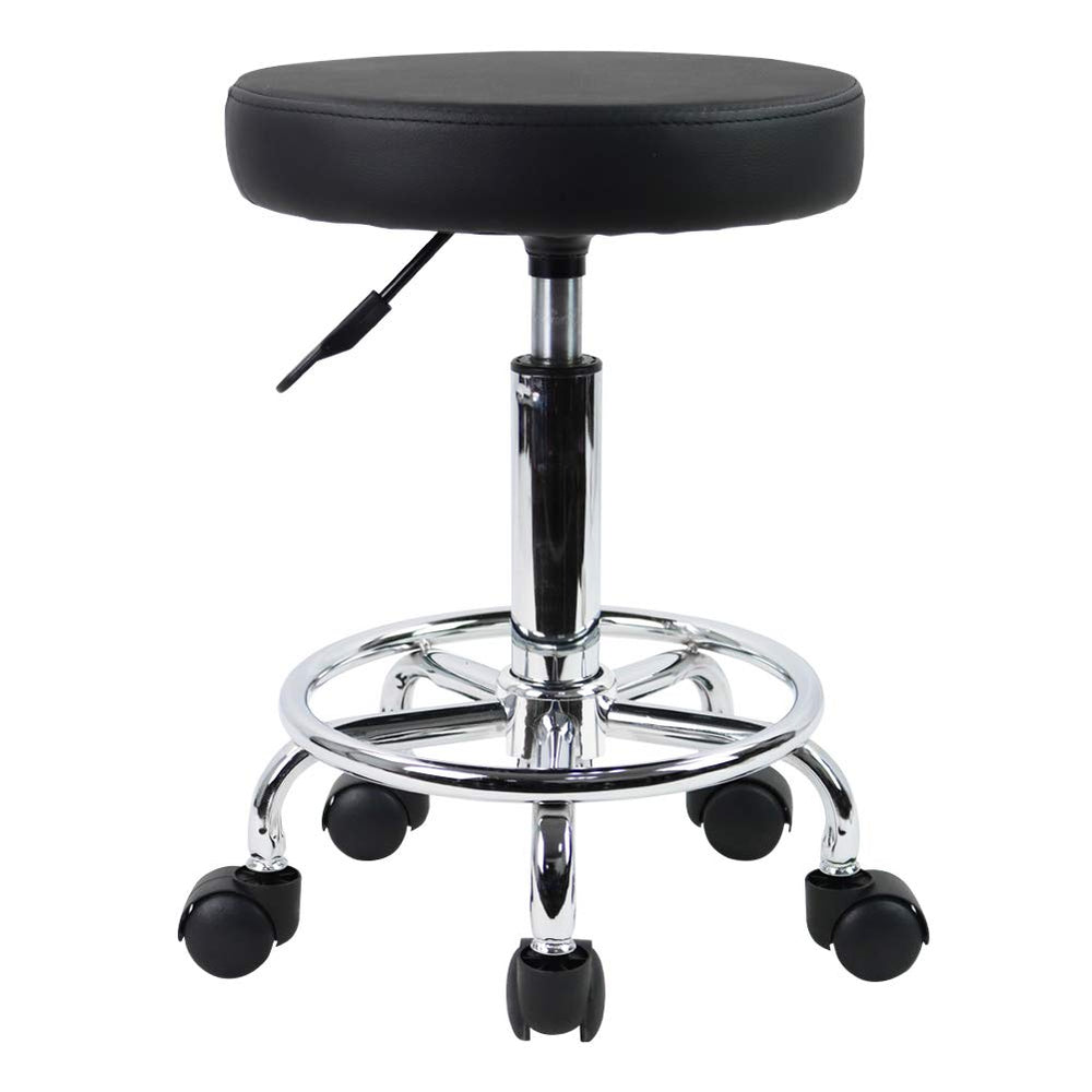 KKTONER PU leather round stool ready for assembly in a compact workspace.