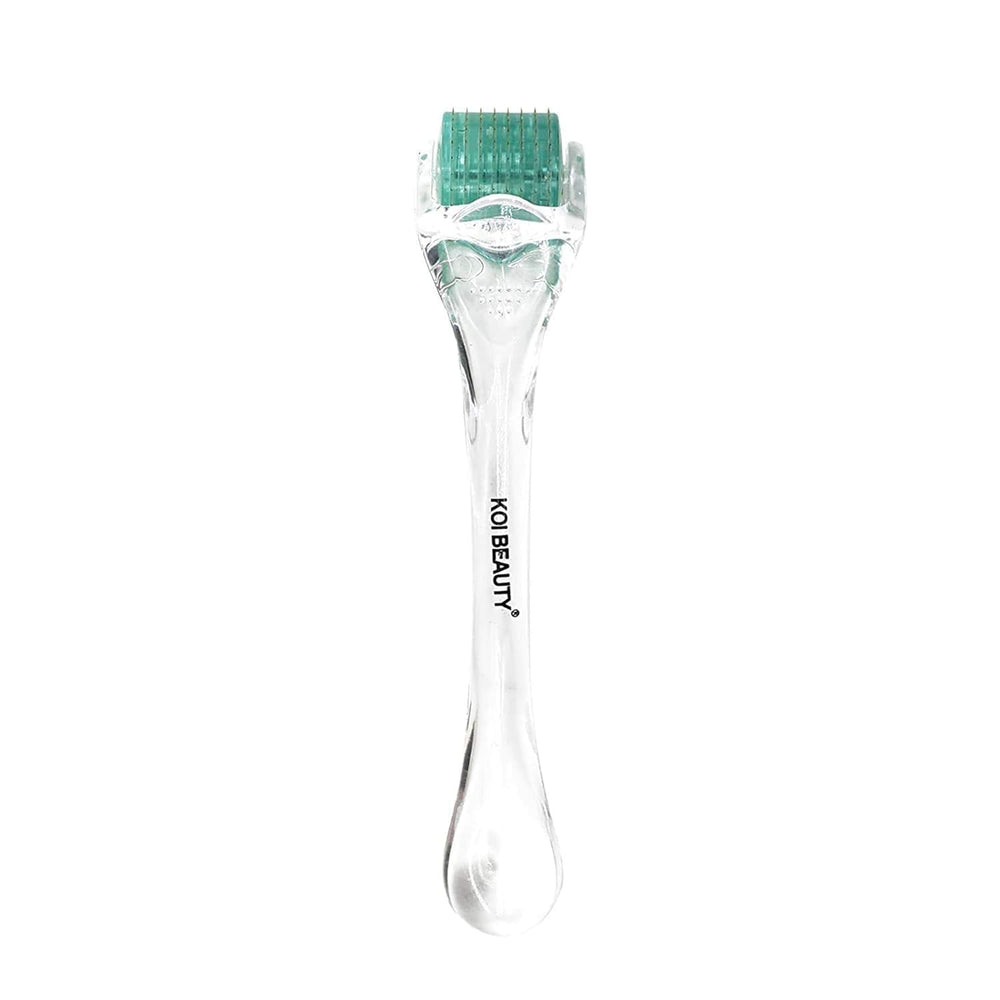 Koi Beauty derma roller close-up with titanium needles for precise micro-needling.