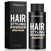 Komoko hair styling powder tin close-up showing compact packaging for on-the-go styling.