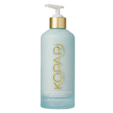 Kopari Hydrating Silk Body Cream bottle with pump for long-lasting moisture.