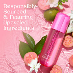 Kopari Pink Guava mist on hair provides light scent and shine.