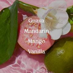 Kopari Pink Guava mist spritzed on skin for refreshing scent.