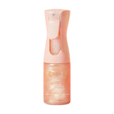 Kopari Rose Gold Sunglaze sunscreen spray provides lightweight protection with glow