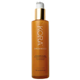 KORA Organics Turmeric Glow Foaming Cleanser bottle for a refreshing, brightening cleanse.