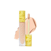 Kosas Revealer Concealer bottle pump for buildable coverage on skin.