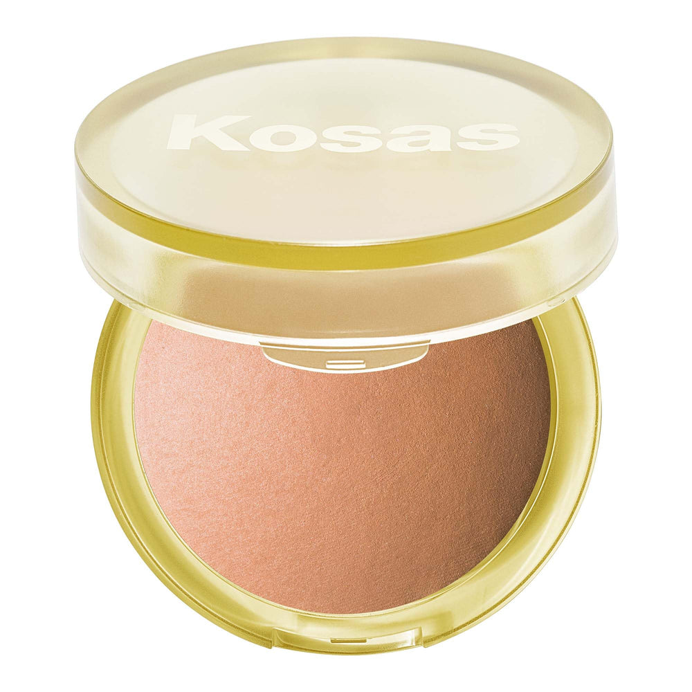 Kosas Sun Show Glowy Warmth Tropic bronzer swatch on cheek for natural bronze glow