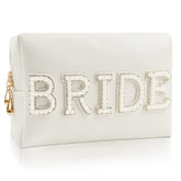 Kovewon bride patch makeup bag with pearl rhinestones for wedding-day cosmetics.