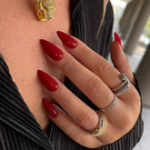 KQueenest red press-on nails in medium almond stiletto set for a chic, long-lasting look