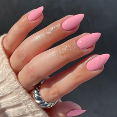 KQueenest rose pink glue-on nails flatlay highlighting durable, lasting wear.
