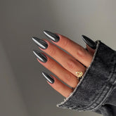 KQueenest smoky grey chrome press-on nails in stiletto shape for a bold look.