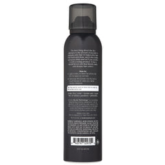 Kristin Ess Brunette Dry Shampoo being applied to refresh oil-prone roots