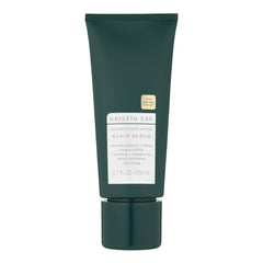 Kristin Ess exfoliante para cabello, botella visible, limpieza suave y detox del cuero cabelludo.