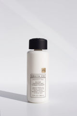 Close-up of Kristin Ess Fragrance Free Daily Shampoo label emphasizing fragrance-free and color-safe features