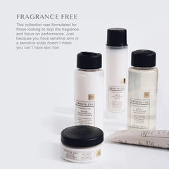 Close-up of Kristin Ess Fragrance Free Shine Enhancing Conditioner label emphasizing fragrance-free benefits