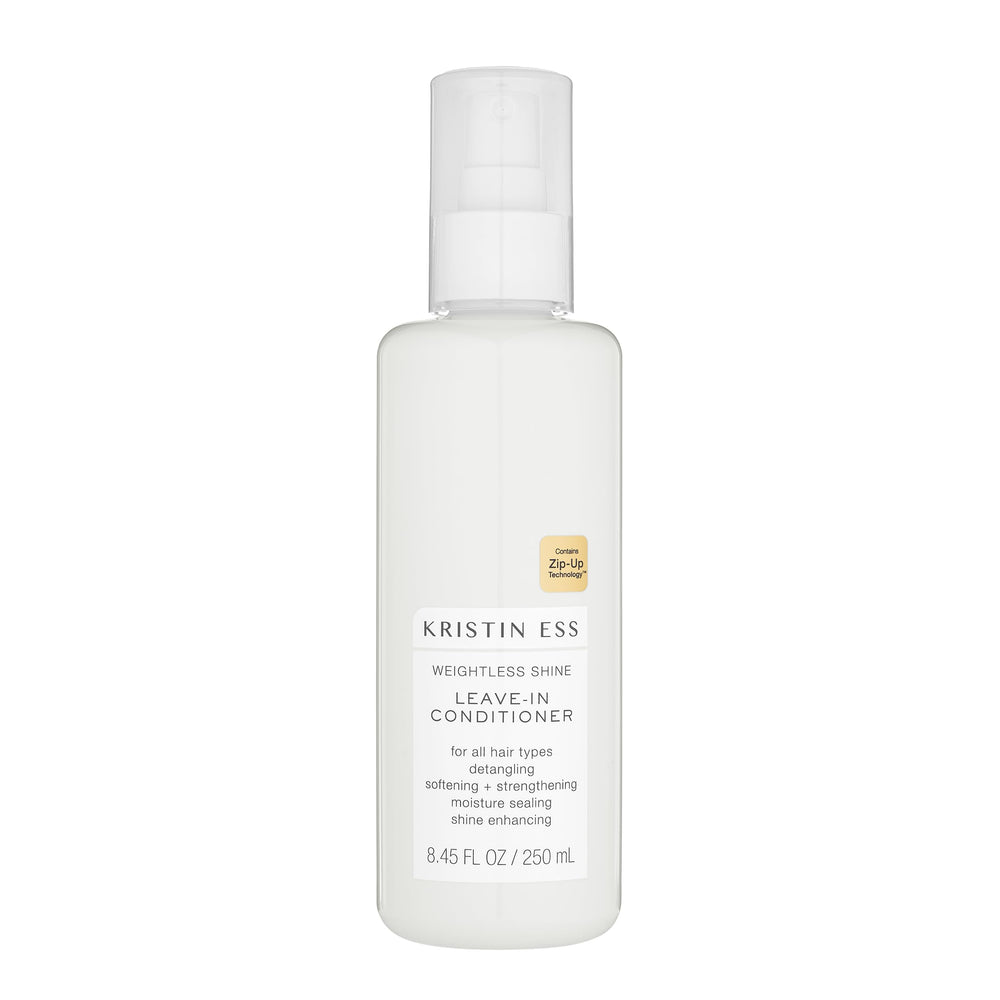 Kristin Ess Hydrating Leave-In Spray bottle shown for moisturized, frizz-free hair.