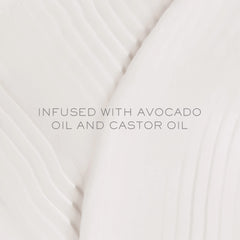 Kristin Ess One Signature Shampoo label close-up highlighting avocado oil benefits.