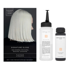 Close-up of Kristin Ess The One Signature Hair Gloss Platinum packaging