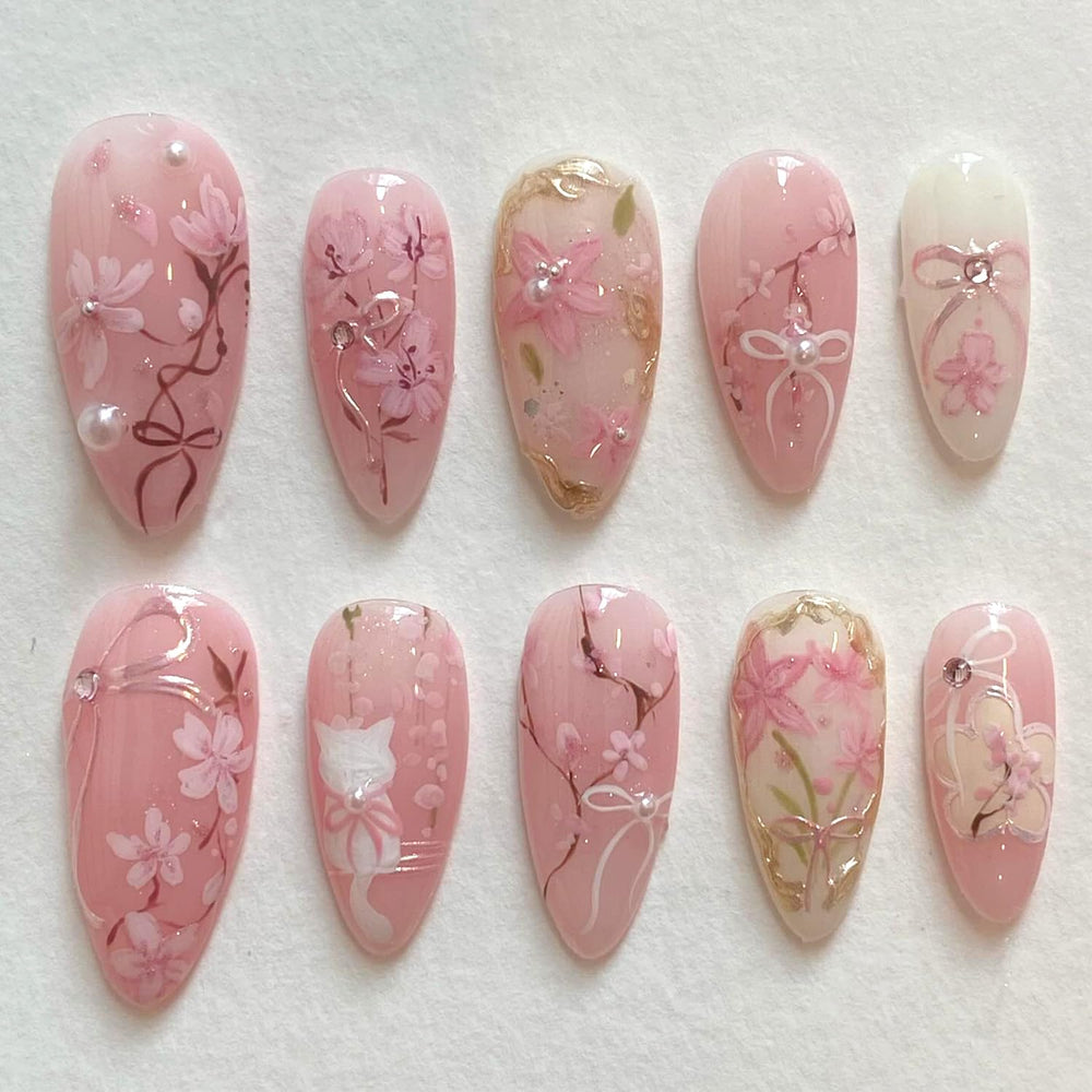 KRTBKR pink flower press-on nails in almond shape for quick at home manicure