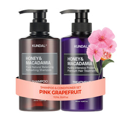 KUNDAL Pink Grapefruit shampoo bottle highlights sulfate-free formula for all hair types.