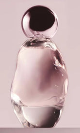 Kylie Cosmic bottle front displays artful design for day-to-night wear.