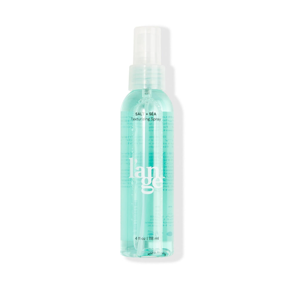L'ANGE HAIR Spray texturizante de sal marina, botella, textura suave y movimiento natural.