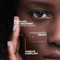La Roche-Posay Hyalu B5 bottle during facial application with gentle massage