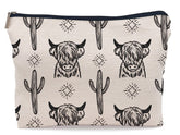 Lacosu Western Cow makeup bag front view shows a stylish western motif and durable exterior.