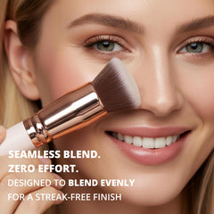 Lamora flat-top kabuki brush applying liquid foundation for even coverage