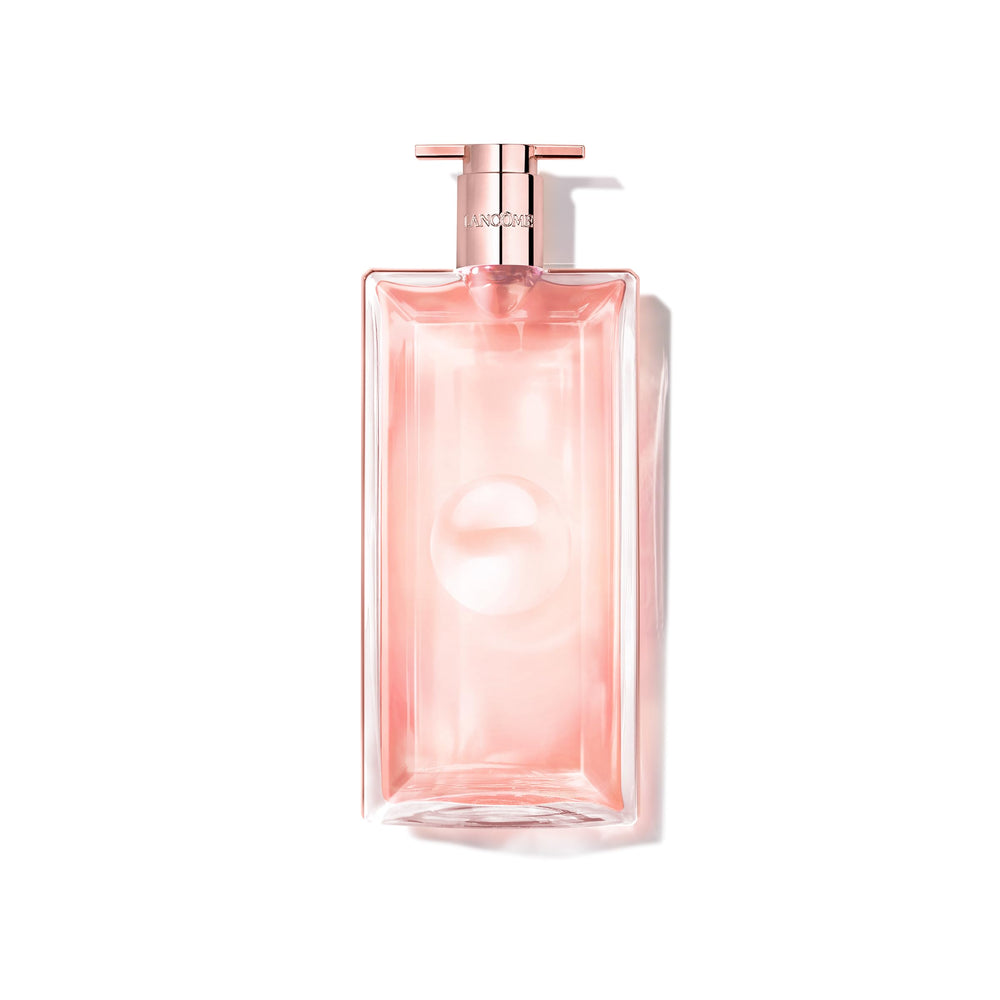Lancôme Idôle bottle laid flat on vanity for modern everyday elegance