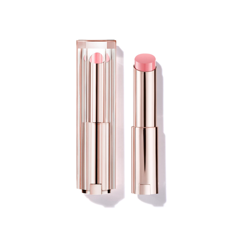 Lancôme Lip Idôle Butterglow balm packaging highlights travel-friendly design for on-the-go hydration.