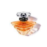 Lancôme Trésor bottle angle showcases elegant crystal design for romantic moments.
