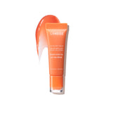 LANEIGE Lip Glowy Balm Peach Iced Tea tube with subtle tint and hydration.