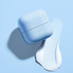 LANEIGE Water Bank Blue Hyaluronic Eye Cream jar close-up shows creamy texture for under-eye hydration