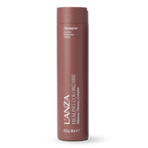 L’ANZA Healing ColorCare Shampoo bottle pouring, color-safe cleansing for vibrant treated hair