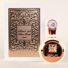 Lattafa Fakhar bottle side angle highlighting elegant premium design for special occasions.