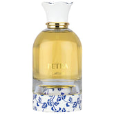 Lattafa Petra fruity bottle detail highlighting plum and rum notes for evenings