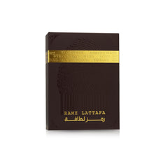 Lattafa Ramz Gold outer box, luxe packaging hints at celebration.