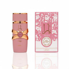Lattafa Yara Elixir spray in mid-pour for a quick fragrance refresh.
