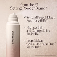 Laura Mercier micro-fine mist application captured mid-spray for even makeup setting.