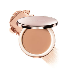 Laura Mercier tinted blur balm packaging highlights portable design for on-the-go use.