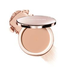 Laura Mercier Tinted Blur Balm texture closeup showing pore-minimizing blur.