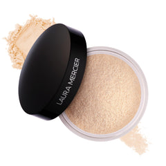 Laura Mercier Translucent Powder jar close-up showing lightweight natural finish